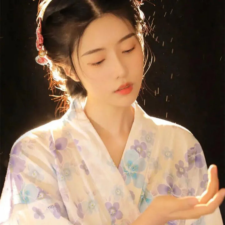 thinking girl wearing white japanese kimono robe costume