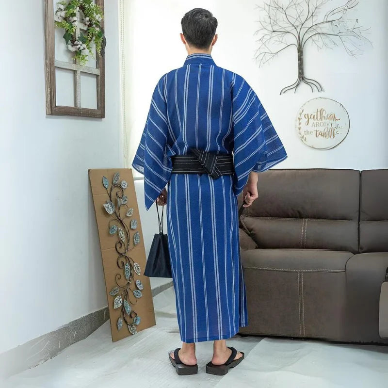 man wearing blue and white striped kimono