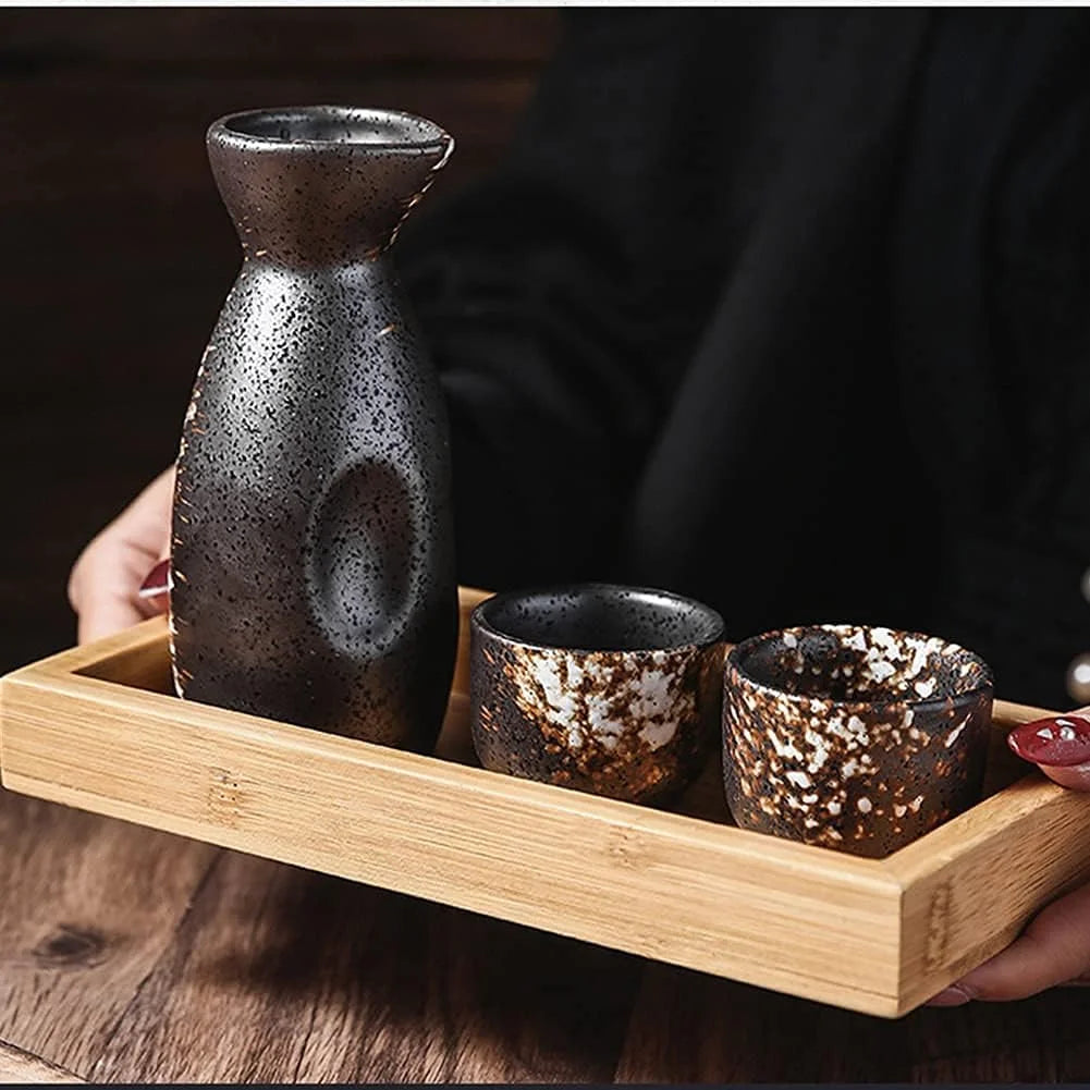 woman holding sake carafe set