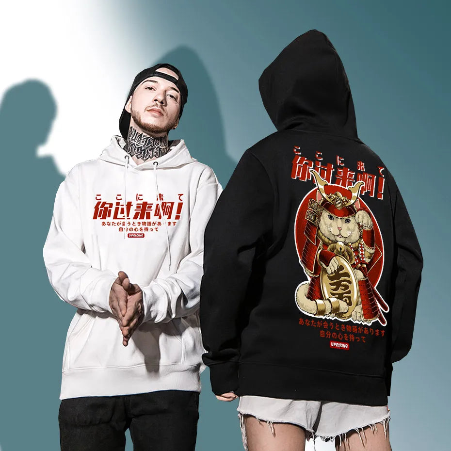 man and woman wearing maneki neko hoodie