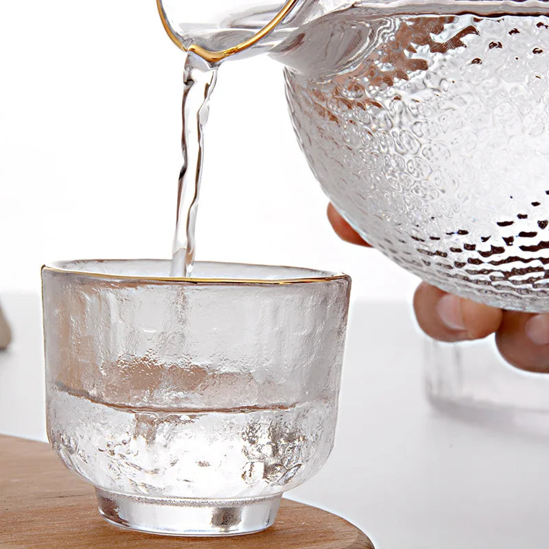 serving sake in a glass sake set