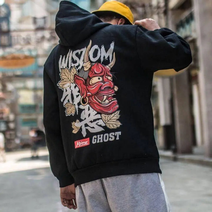 man wearing black japanese oni hoodie