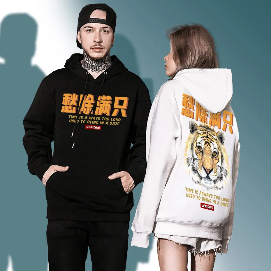 man and woman wearing japanese tiger hoodie