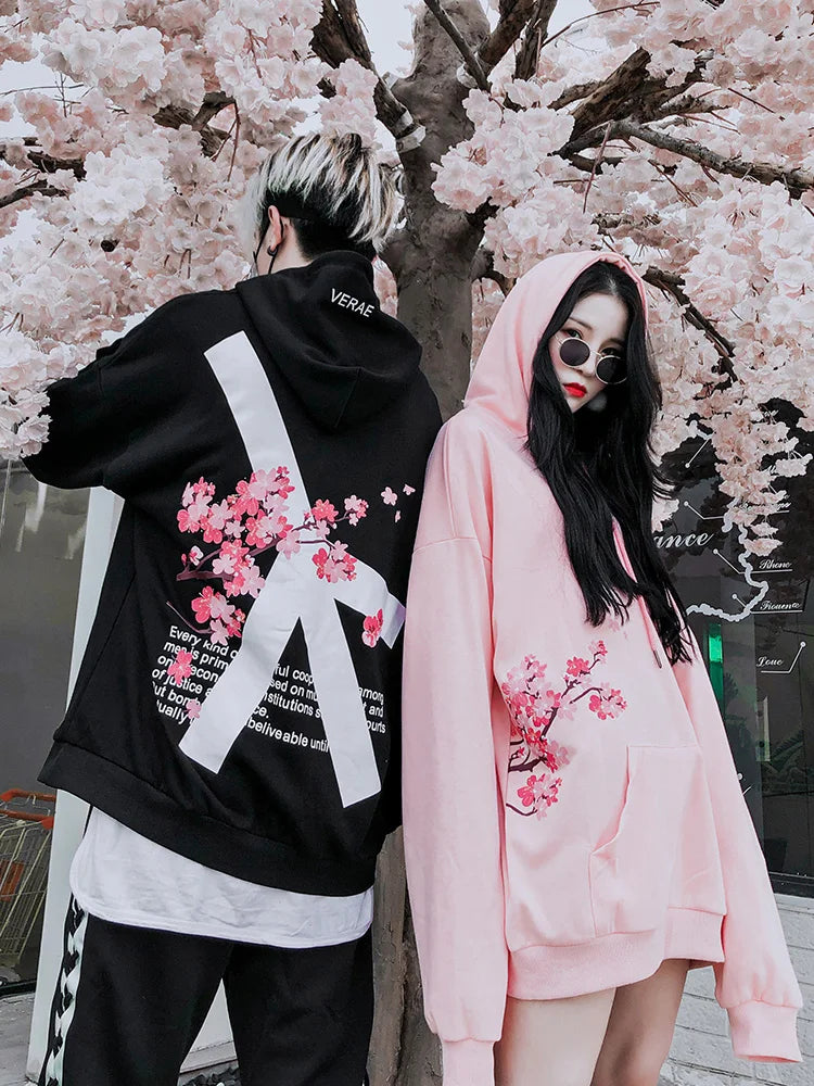 man and woman weraing japanese cherry blossom hoodie