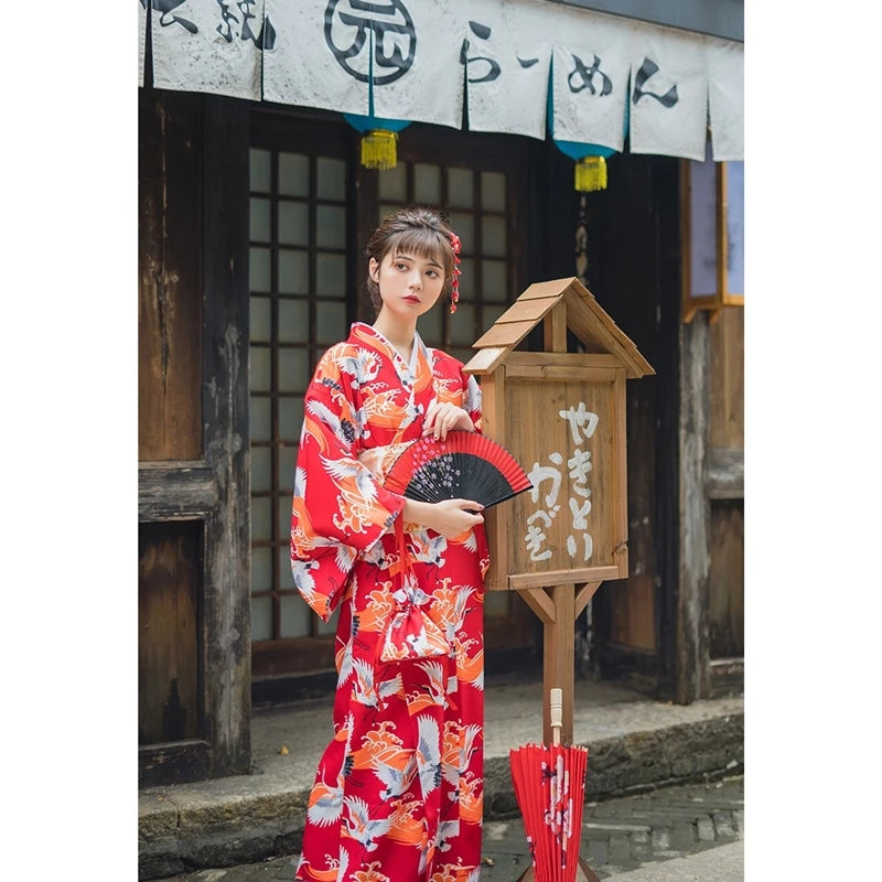 woman in a japan street with a kimono crane