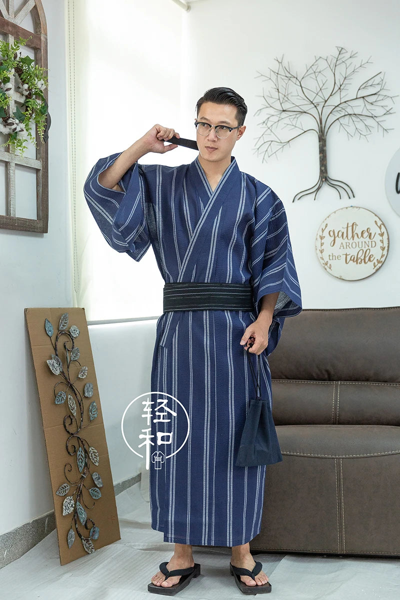 man wearing blue yukata