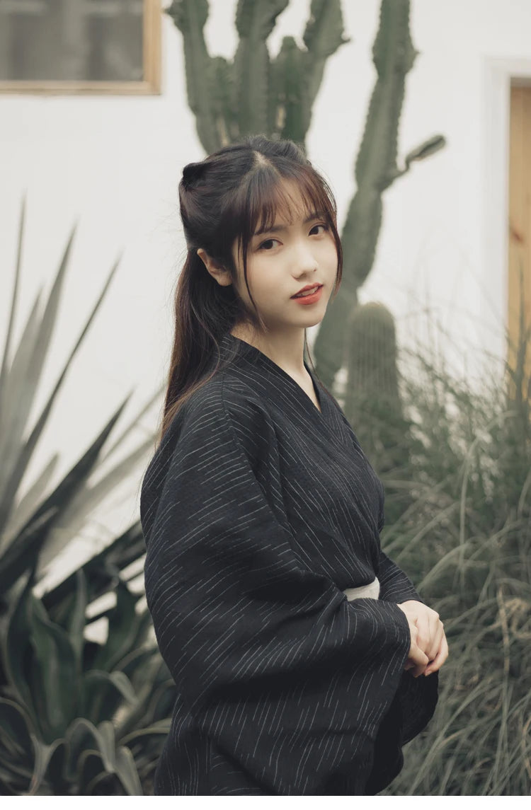 thinking woman with a traditional womens japanese kimono