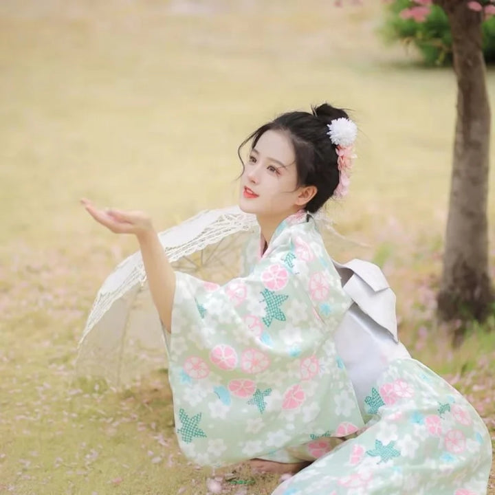 happy woman with a green floral kimono robe