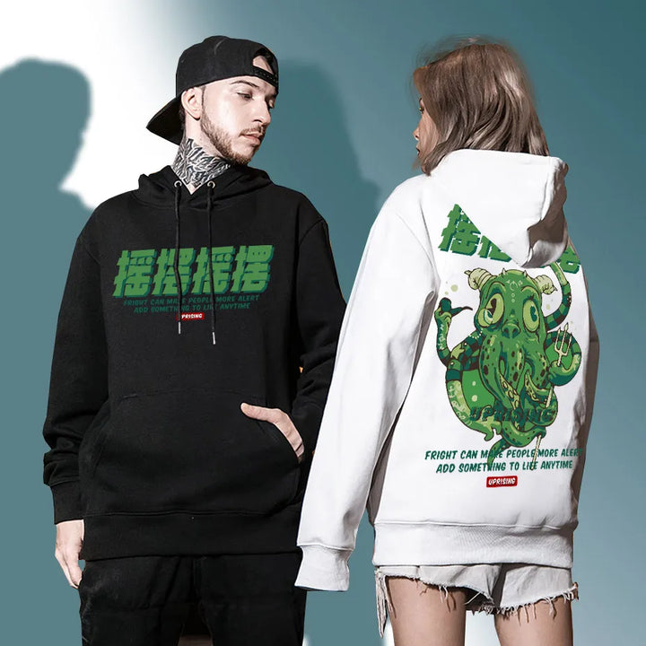 man and woman wearing octopus hoodie