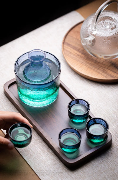 glass cold sake set on a table