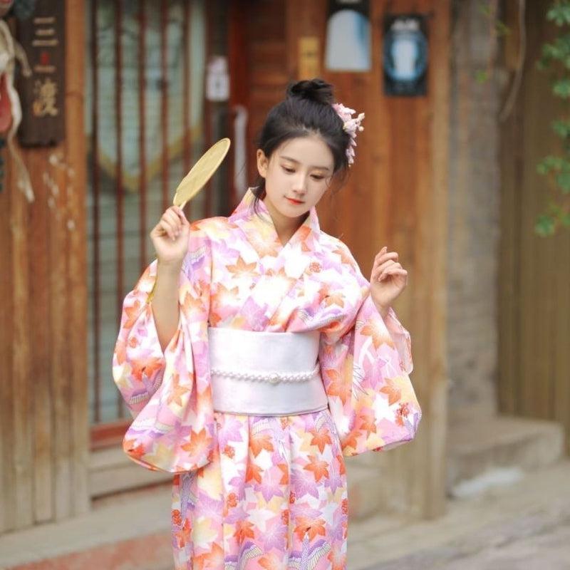 dancing woman wearing a kimono floral