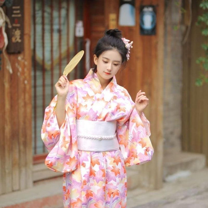 dancing woman wearing a kimono floral