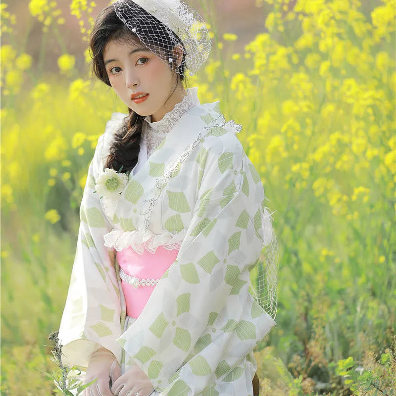 shy japanese woman wearing a green lace kimono