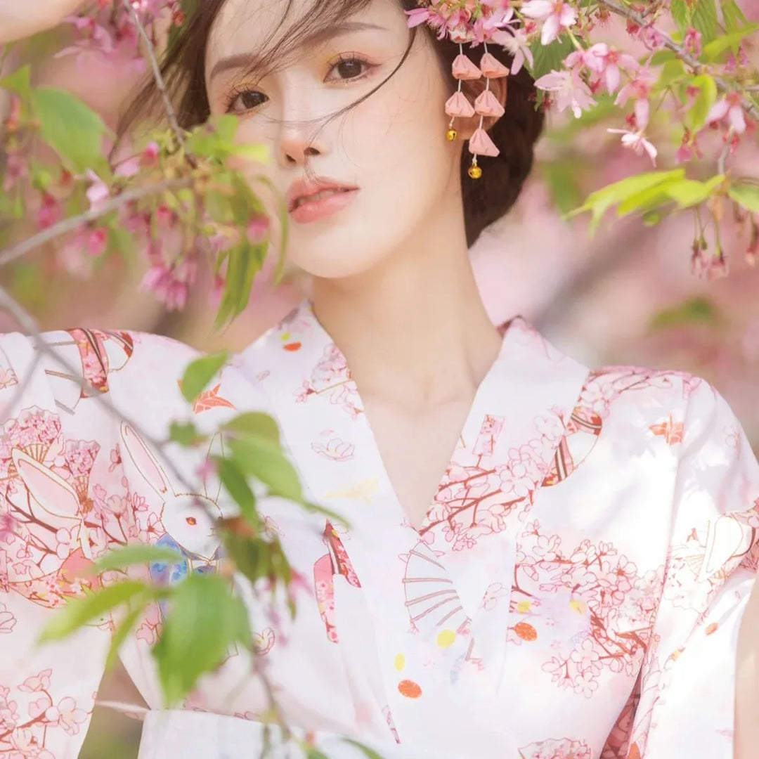 woman wearing pink and white kimono