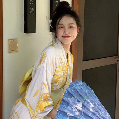 happy japanese woman with a white kimono dress