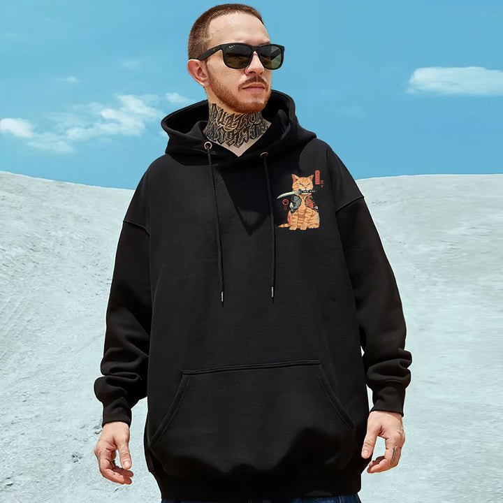 front of a man wearing a samurai cat hoodie