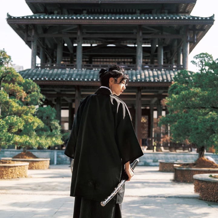 man wearing black kimono cosplay