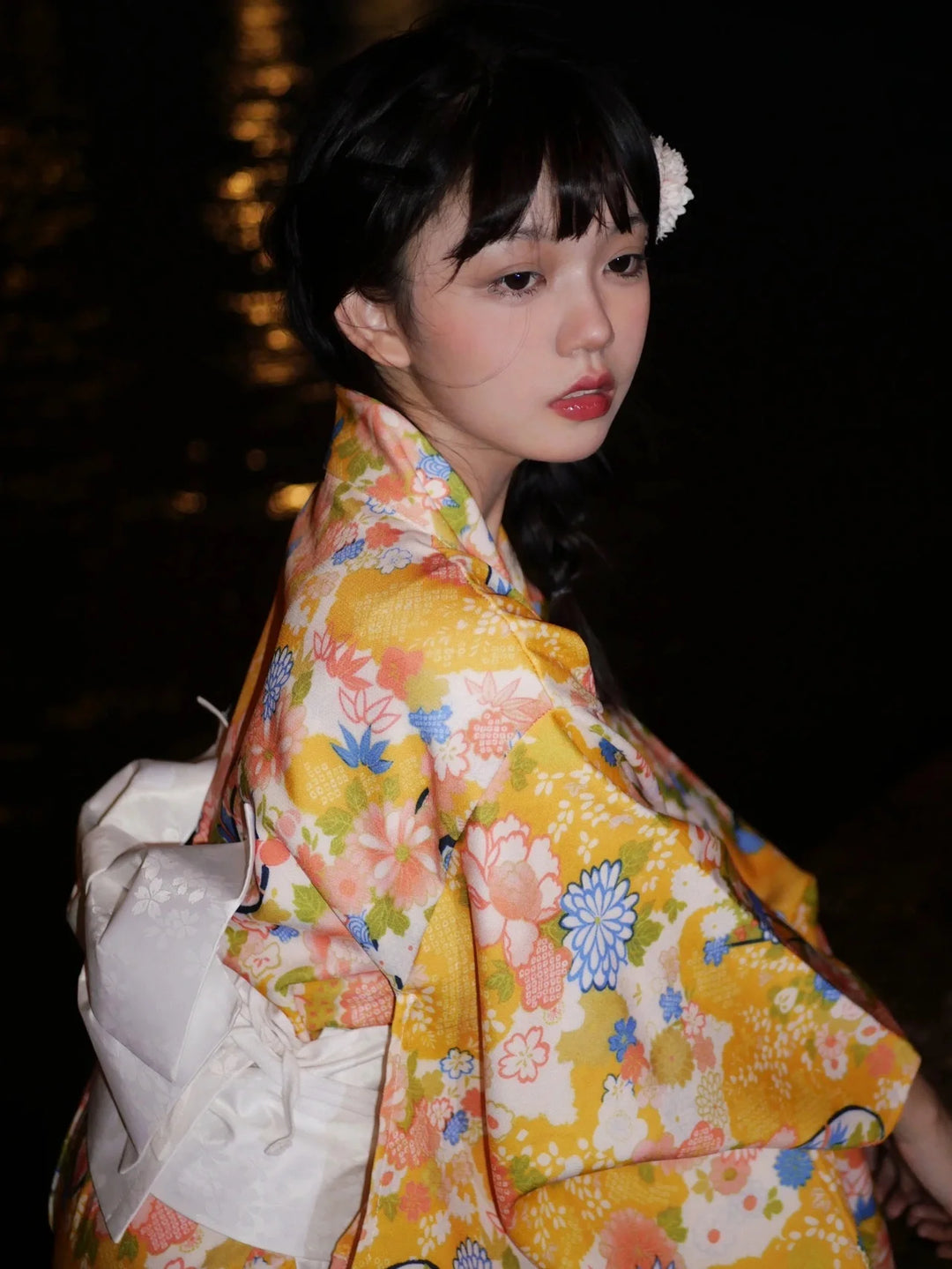 shy woman with a yellow kimono robe