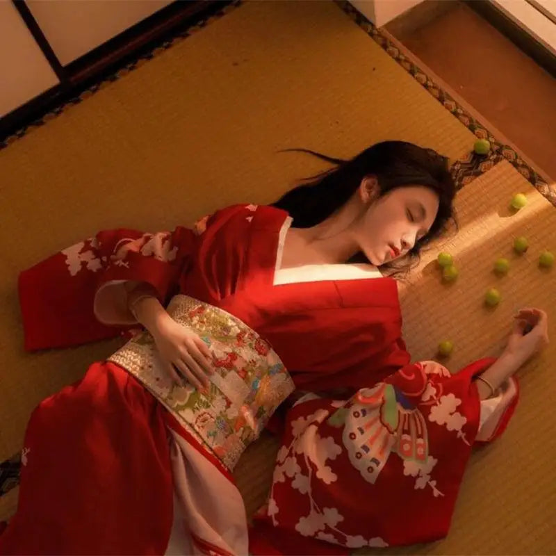 sleeping woman with red kimono robe