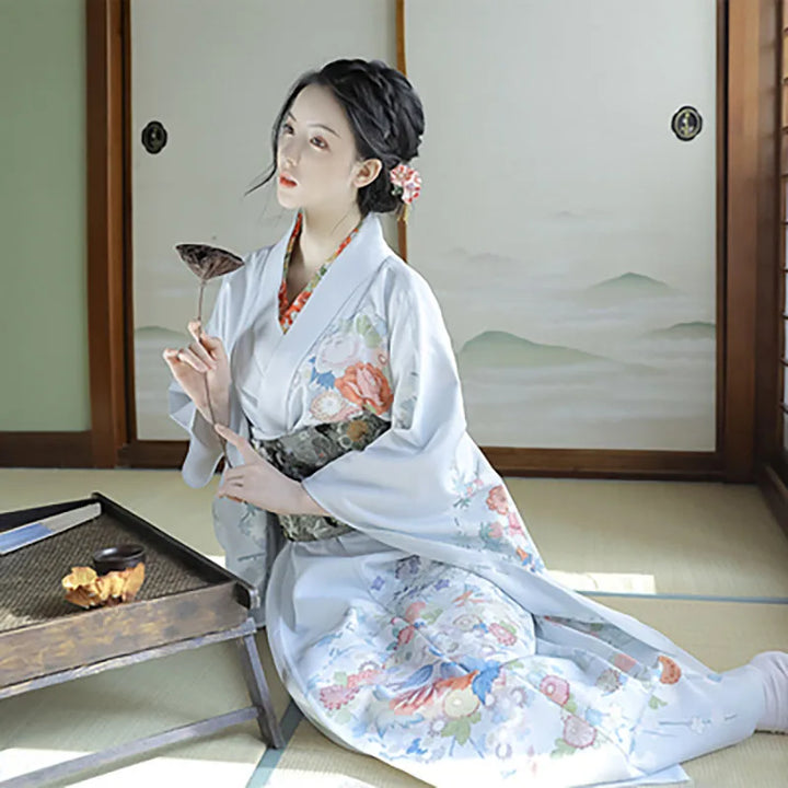 sitted japanese woman with a white kimono japanese