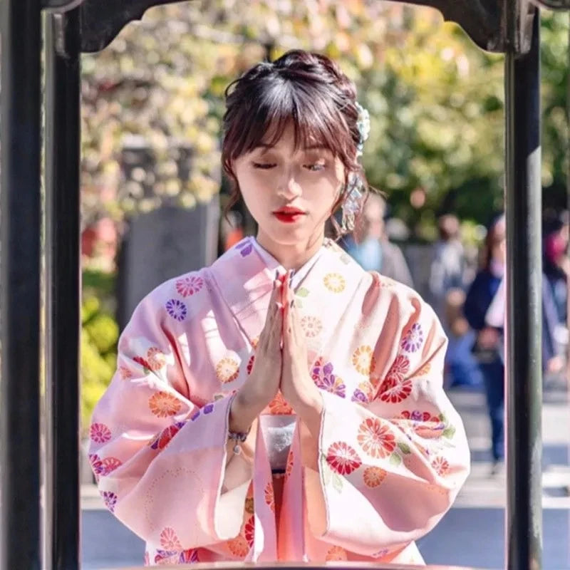 japanese woman wearing pink kimono