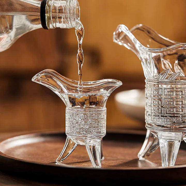 serving alcohol on a sake set glass