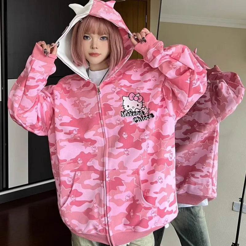 woman wearing pink hello kitty bape hoodie