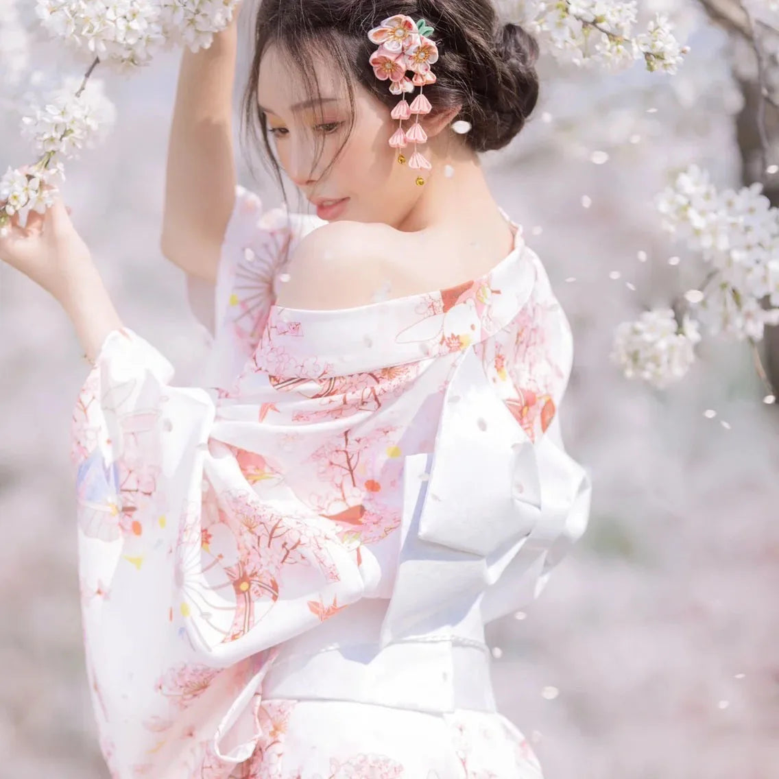 woman wearing pink and white japanese kimono