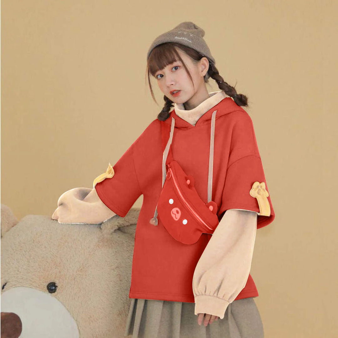 woman wearing red kawaii bear hoodie