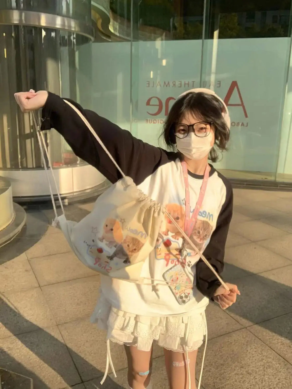 japanese woman with kawaii cat hoodie