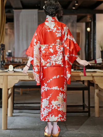 woman wearing red satin silk floral kimono robe