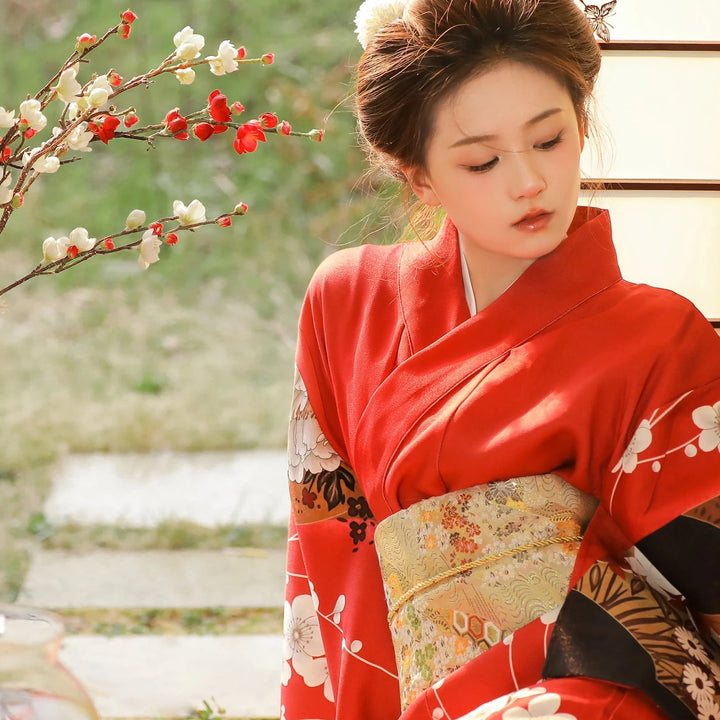 sad woman with red japanese kimono robe