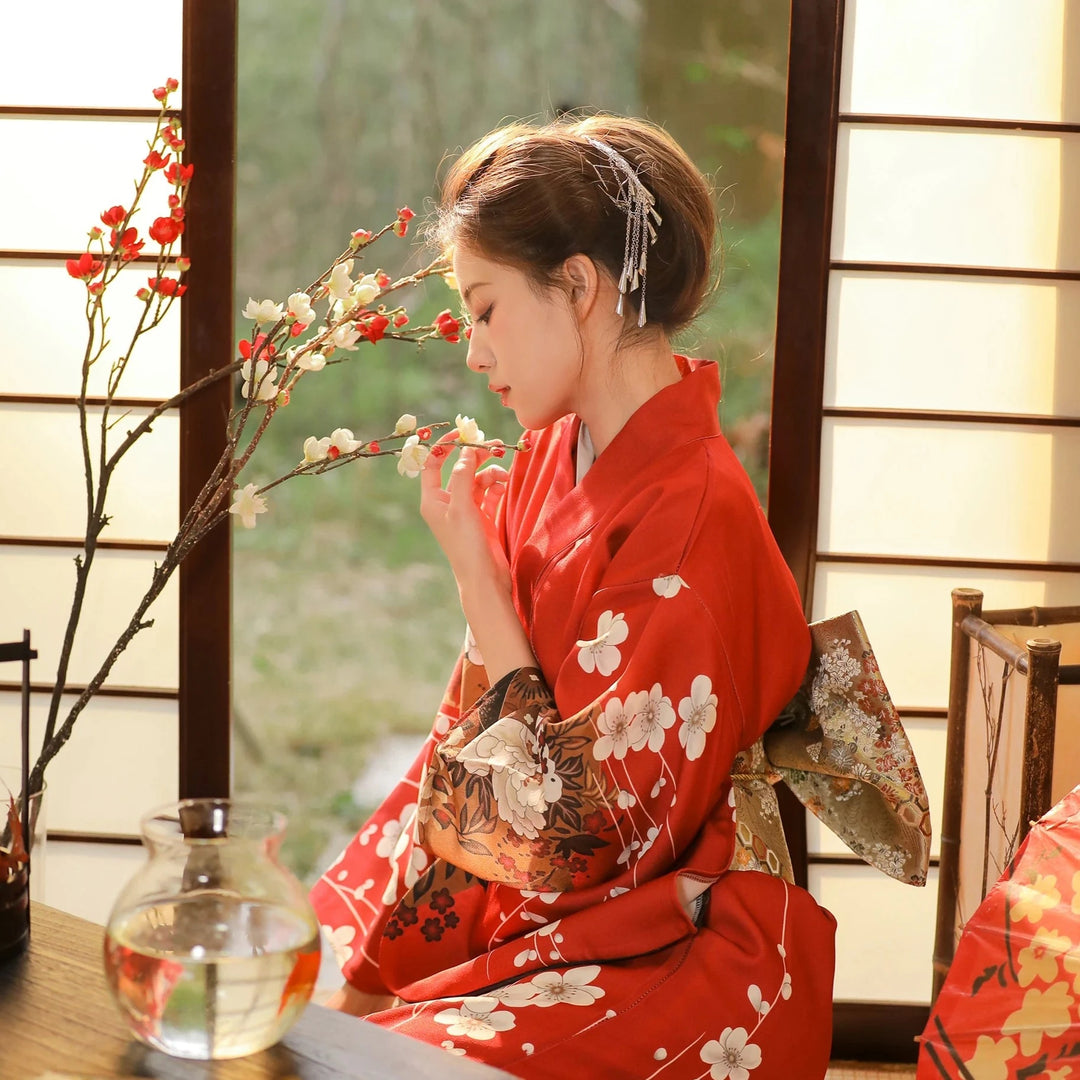 shy woman with a red japanese kimono robe