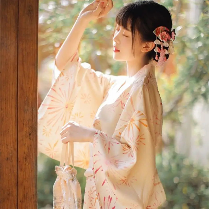 shy woman with a yellow silk kimono robe