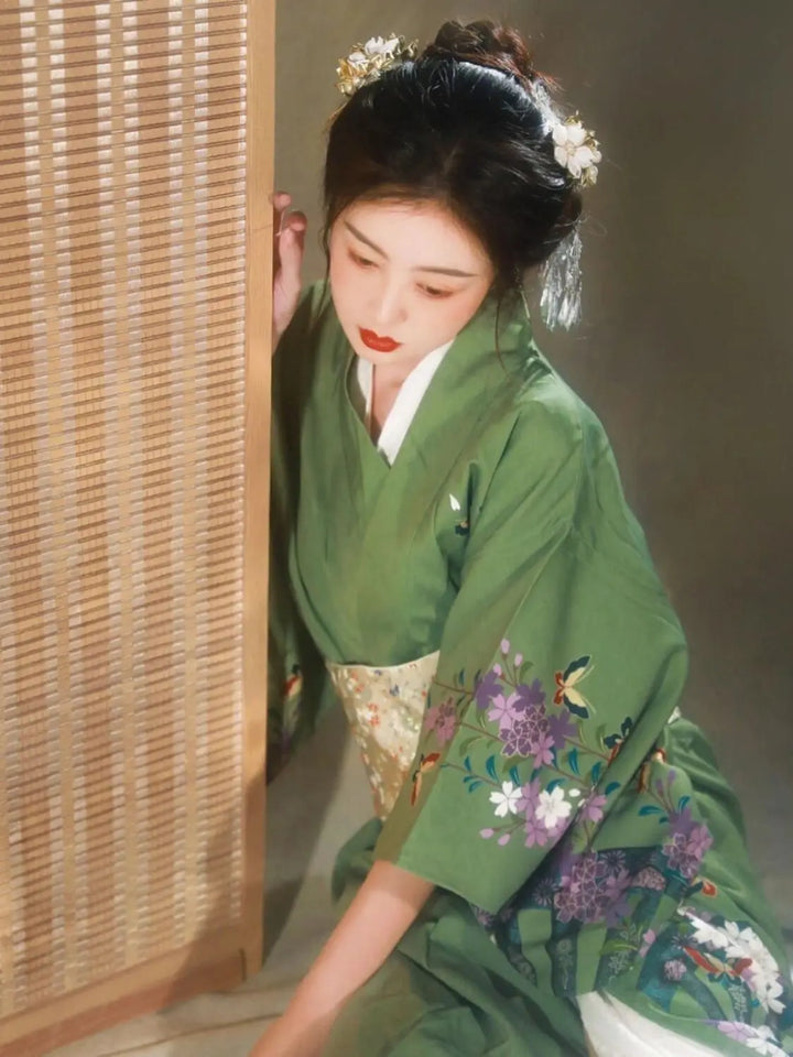 woman wearing japanese green kimono robe