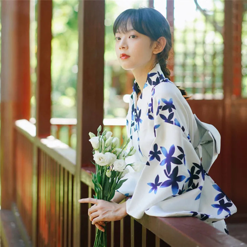 thinking woman with a blue and white kimono