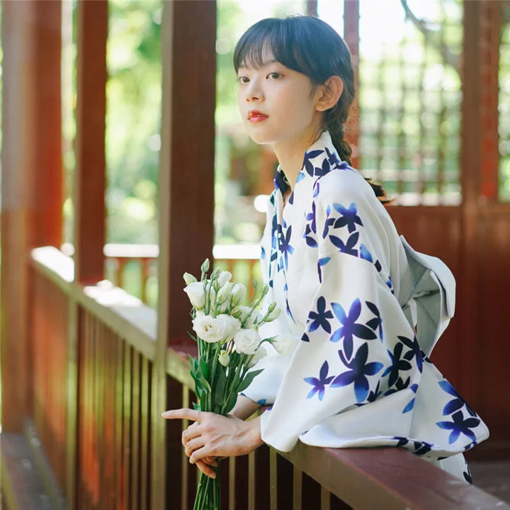 thinking woman with a blue and white kimono