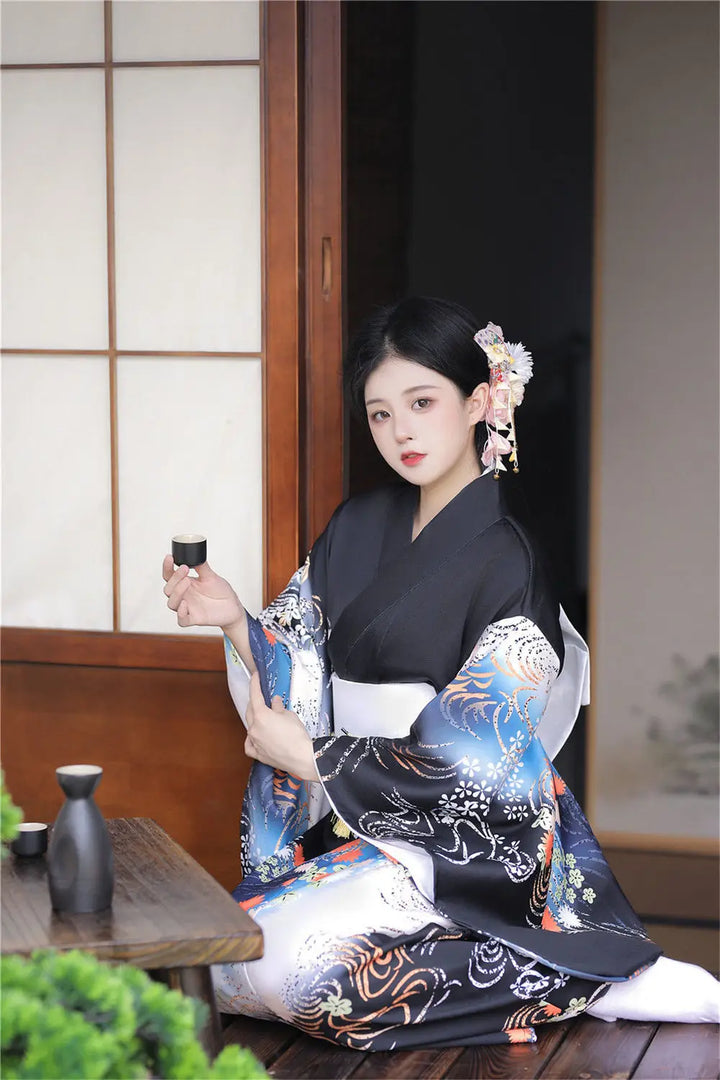 sitted shy woman wearing black japanese kimono robe