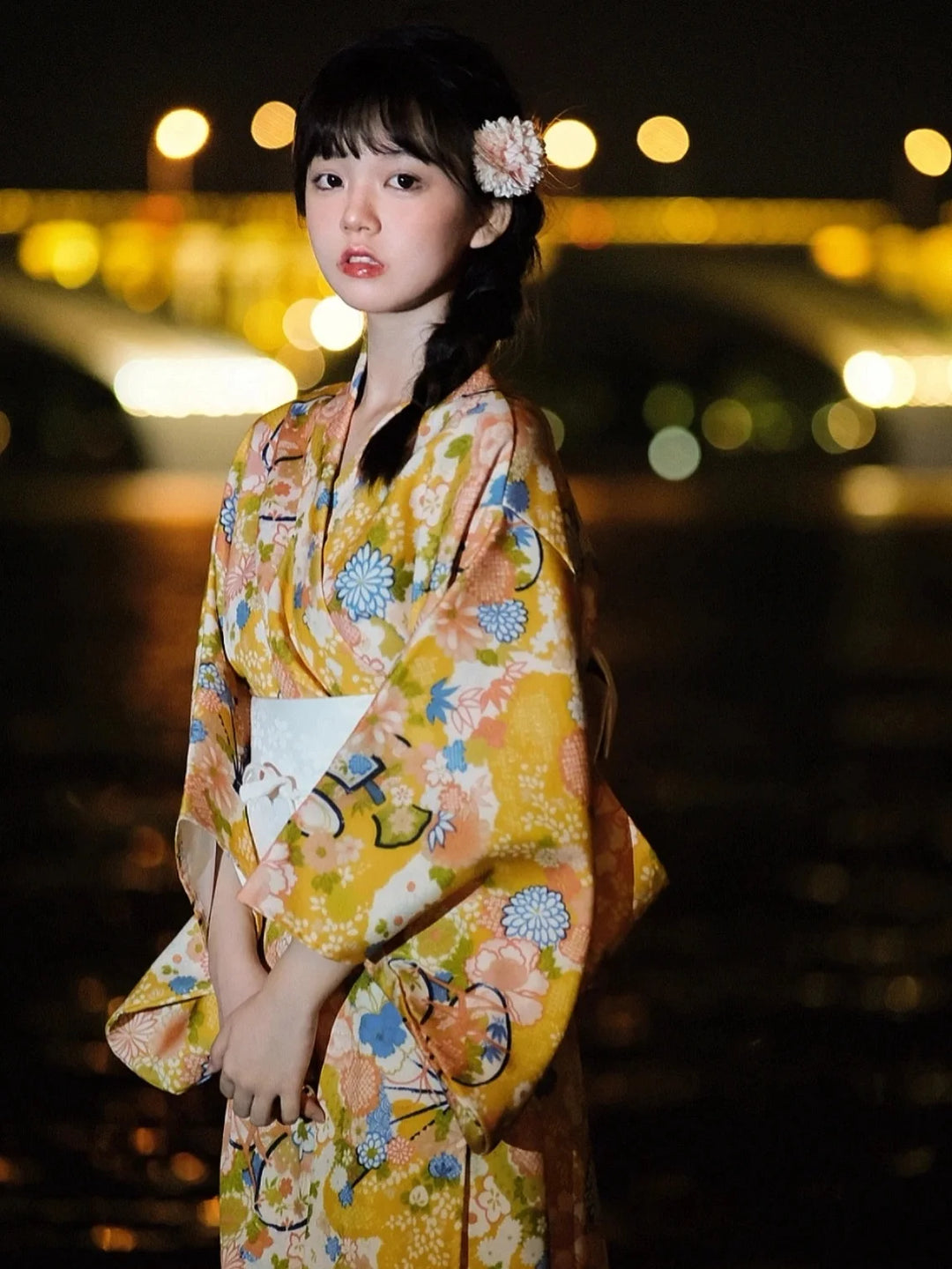 woman wearing yellow kimono robe