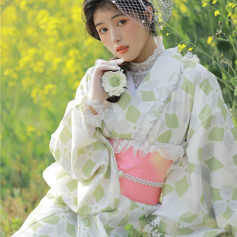 happy woman wearing green lace kimono