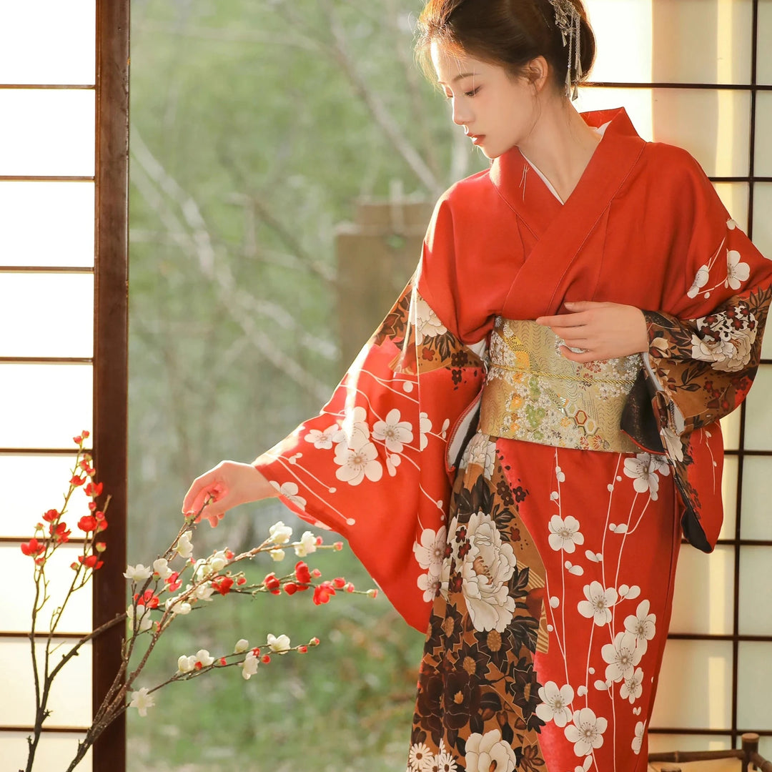 woman wearing a red japanese kimono robe