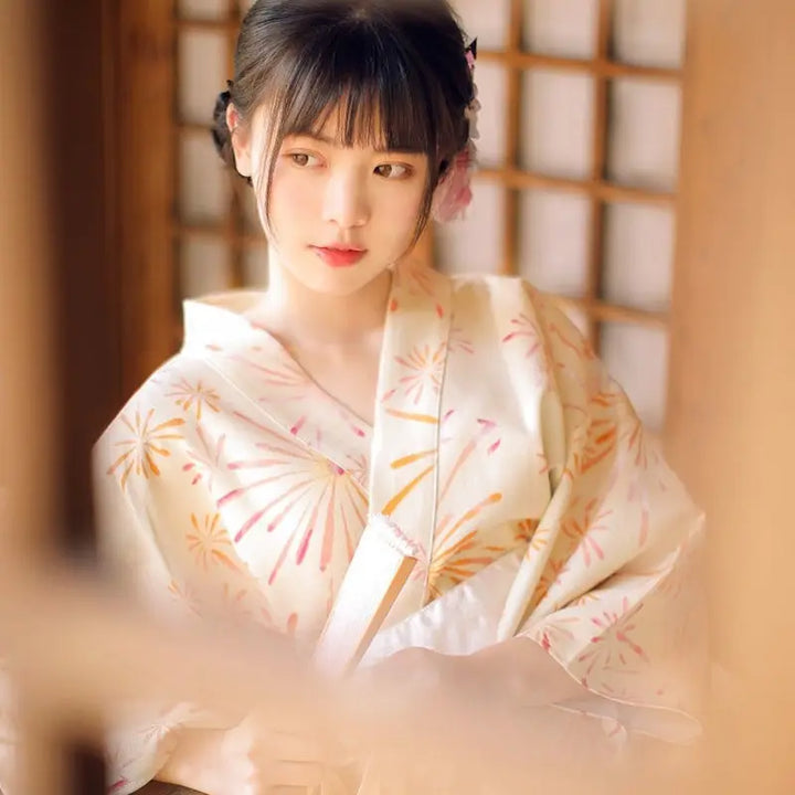 japanese woman wearing yellow silk kimono robe