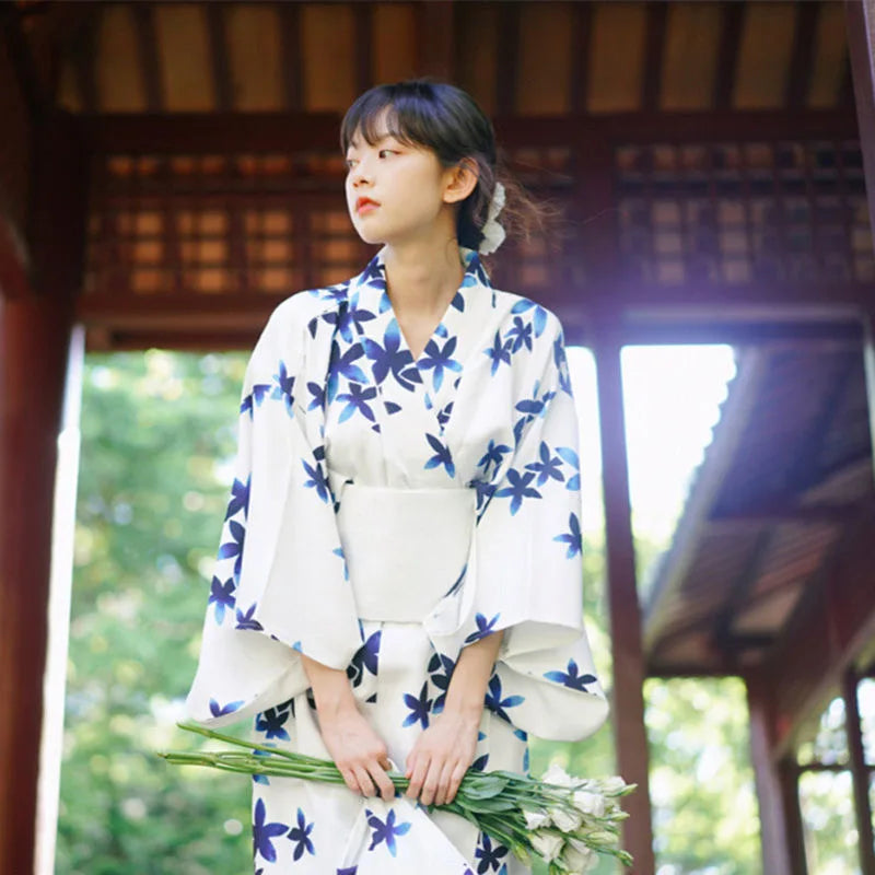 woman weraing a blue and white kimono