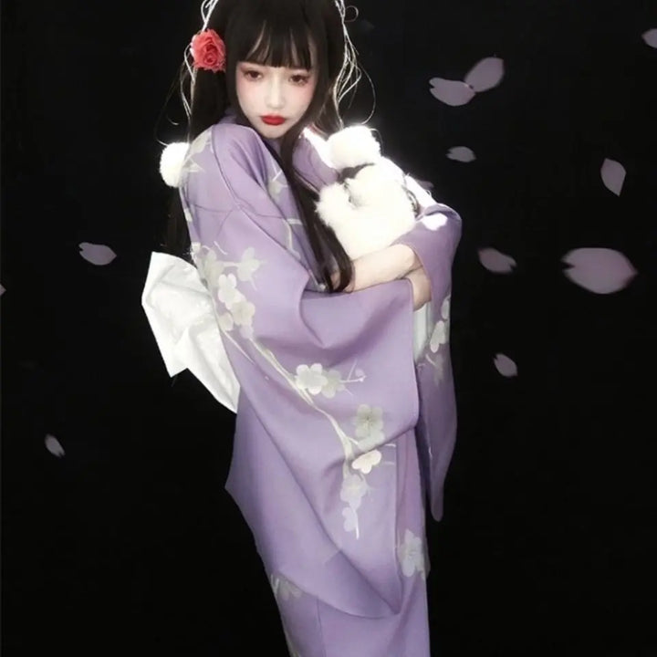 woman wearing a purple kimono