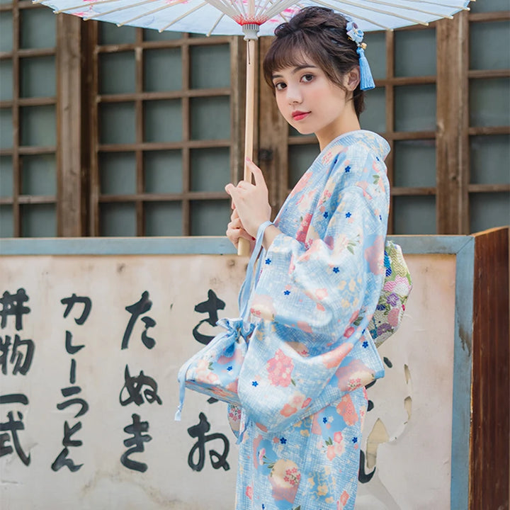 woman wearing blue kimono robe