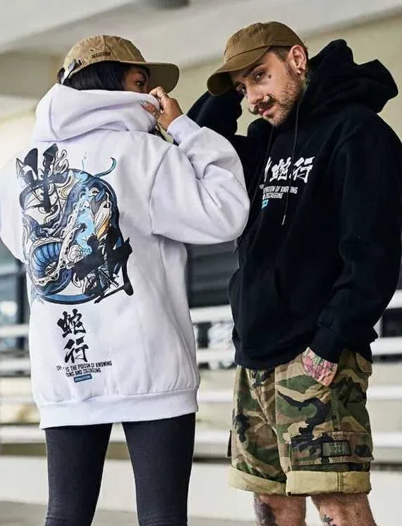 man and woman hipster wearing hoodie with dragon