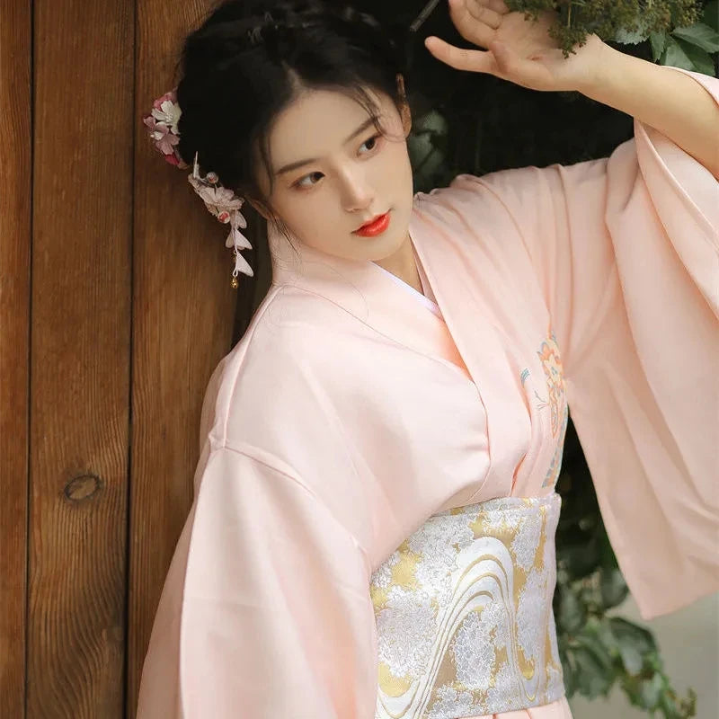 japanese woman with a light pink kimono