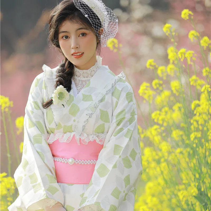 glad woman wearing a green lace japanese kimono