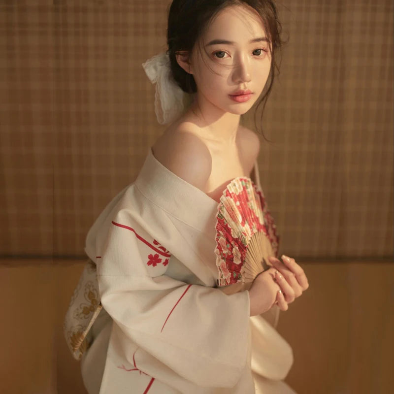 shy woman wearing white kimono robe