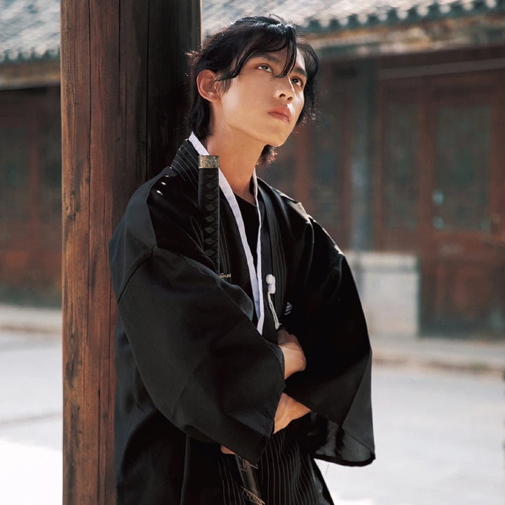 thinking man with a black kimono cosplay